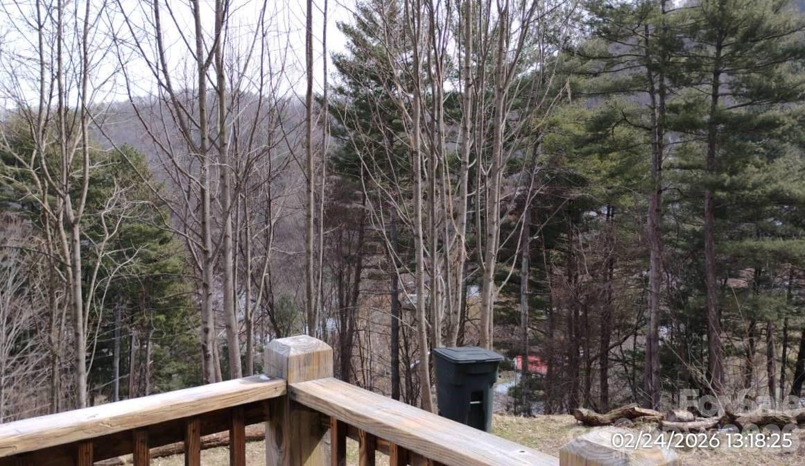115 Paradise Mountain Road Canton, NC 28716 - Photo 12 of 12 a view of a wooden fence and trees