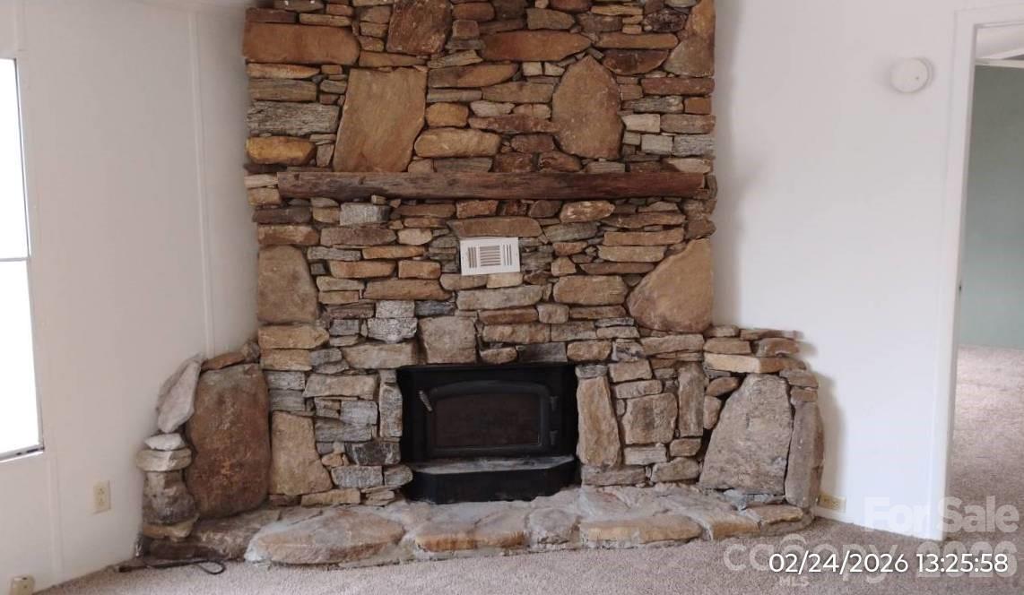 115 Paradise Mountain Road Canton, NC 28716 - Photo 6 of 12 a close view of a fireplace