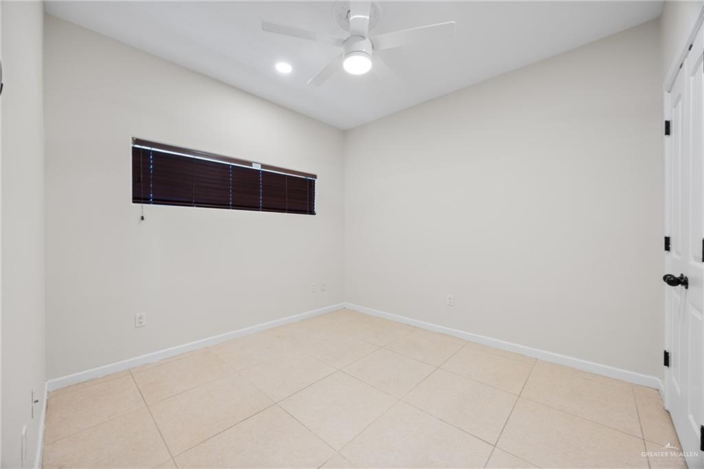 813 Travis Street, Unit 408 Mission, TX 78572 - Photo 14 of 25 a view of an empty room