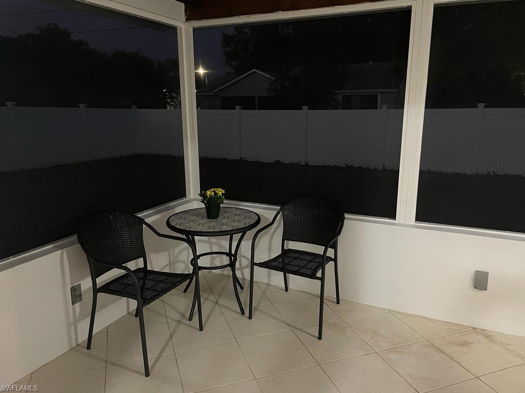 18613 Sebring Road Fort Myers, FL 33967 - Photo 9 of 12 a table and chairs in a kitchen