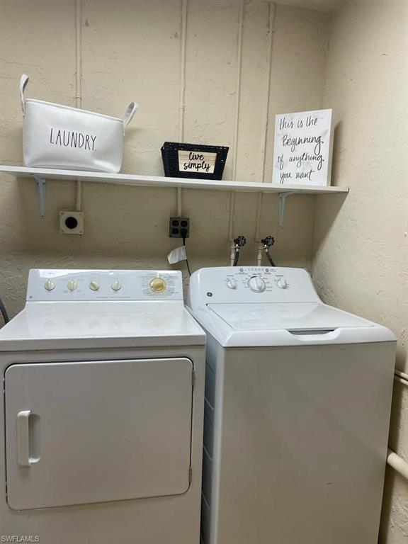 18613 Sebring Road Fort Myers, FL 33967 - Photo 10 of 12 a utility room with dryer and washer