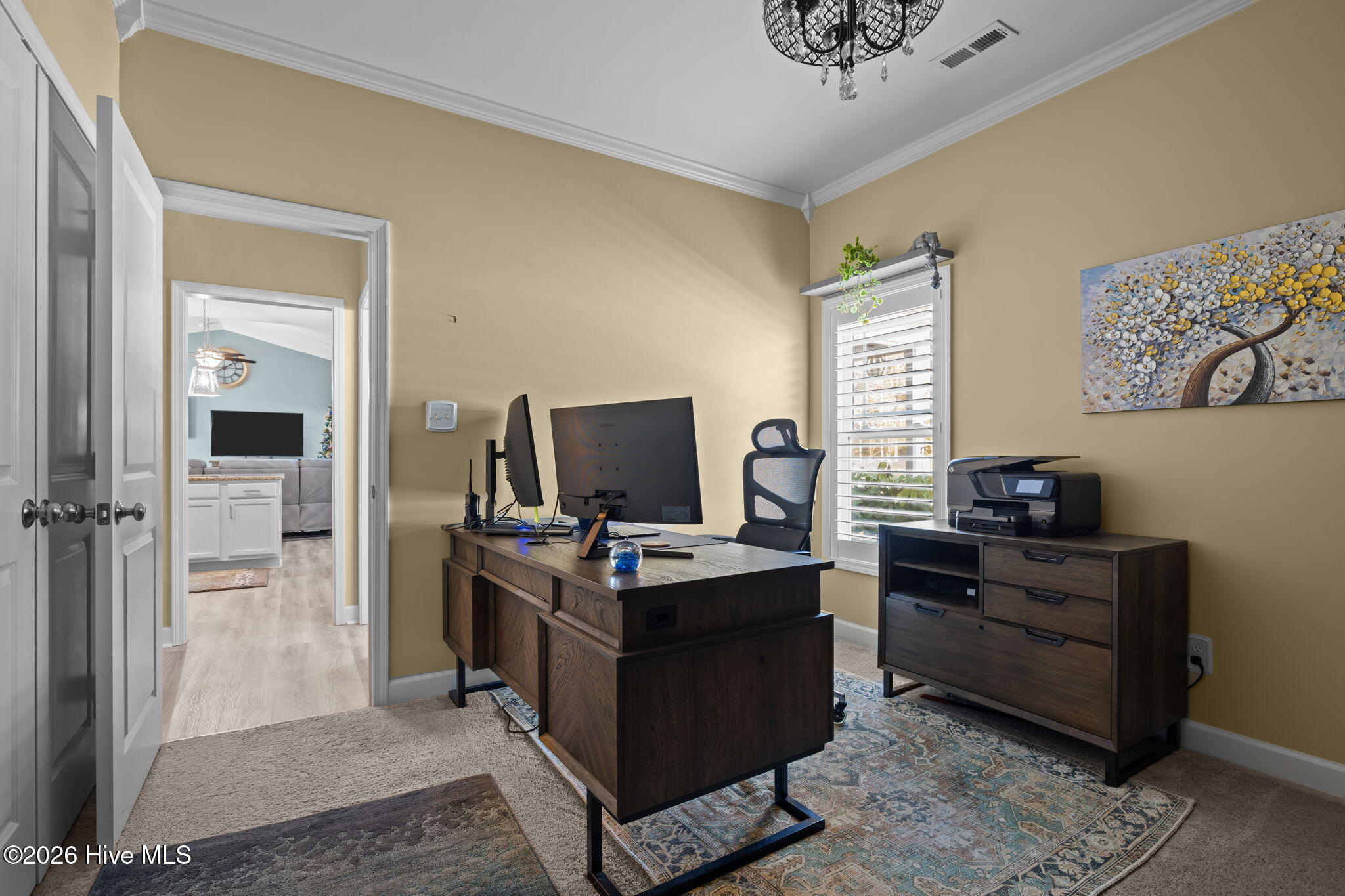 109 Ridgeline Drive Beaufort, NC 28516 - Photo 27 of 65 2nd Bedroom currently set up as an office. Furniture is included. Monitors and printer are not.