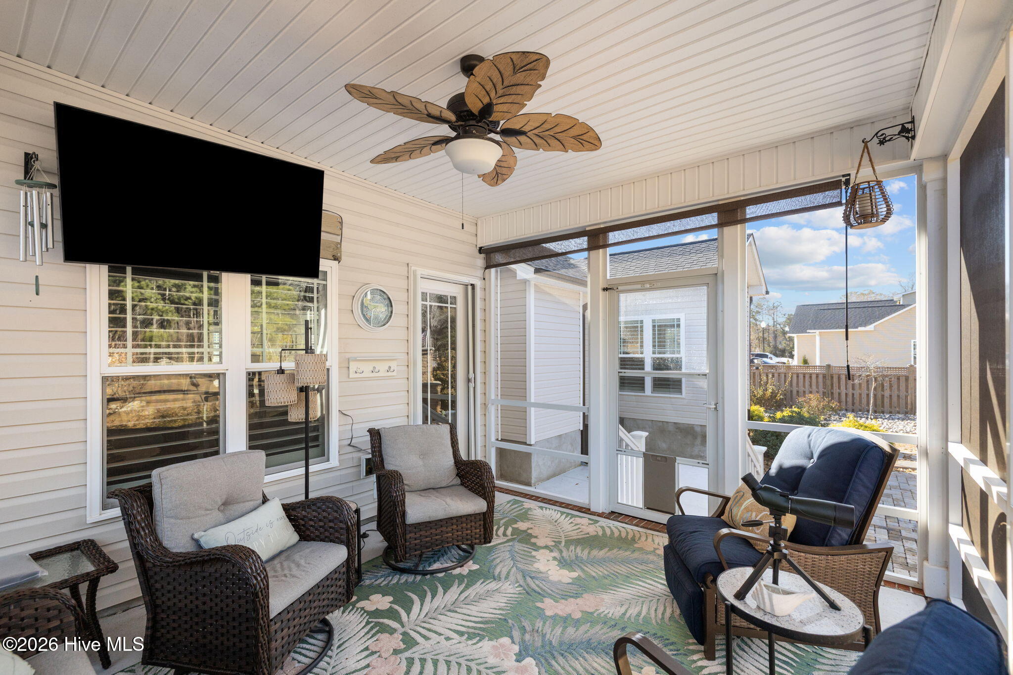 109 Ridgeline Drive Beaufort, NC 28516 - Photo 36 of 65 Screened-in back porch with walk mounted tv.