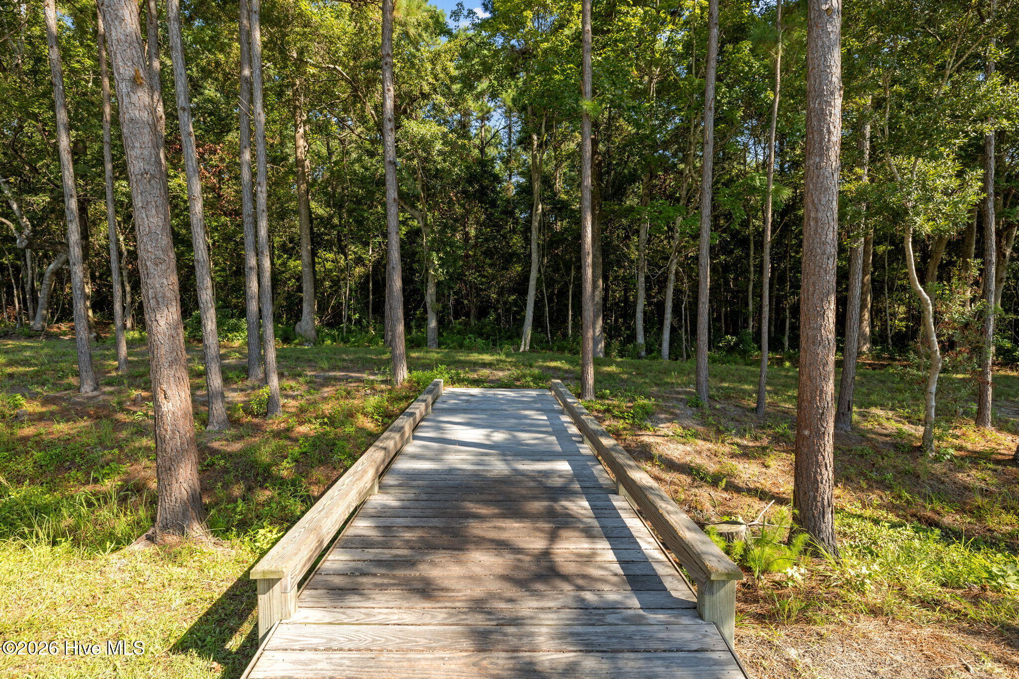 109 Ridgeline Drive Beaufort, NC 28516 - Photo 47 of 65 Custom wooden bridge. Property boundry continues just past the second drainage ditch on the other side of the bridge.