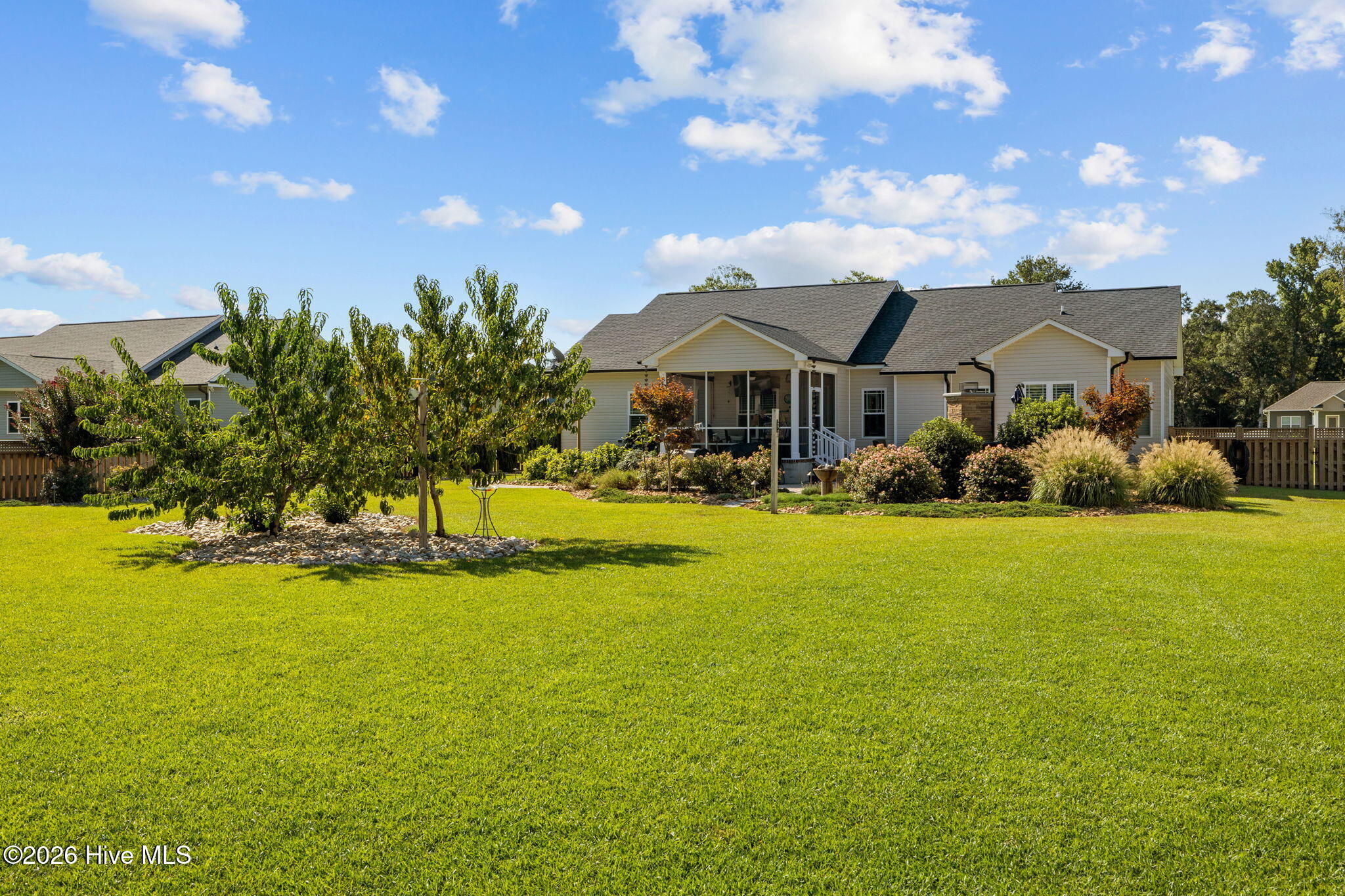 109 Ridgeline Drive Beaufort, NC 28516 - Photo 48 of 65 Middle planting bed includes peach trees, lime and lemon trees.