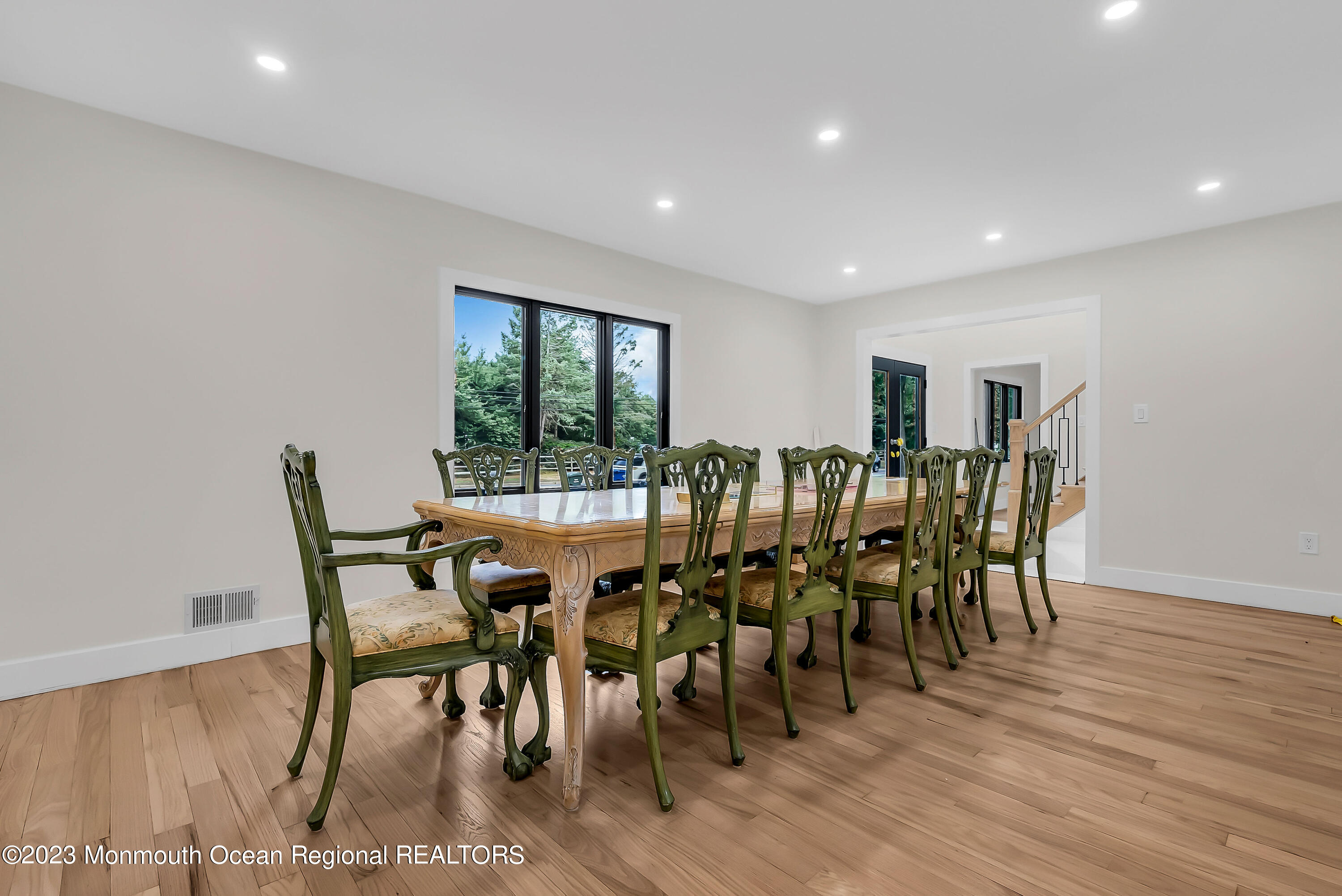 265 Whalepond Road Oakhurst, NJ 07755 - Photo 11 of 34 a view of a dining room with furniture and wooden floor
