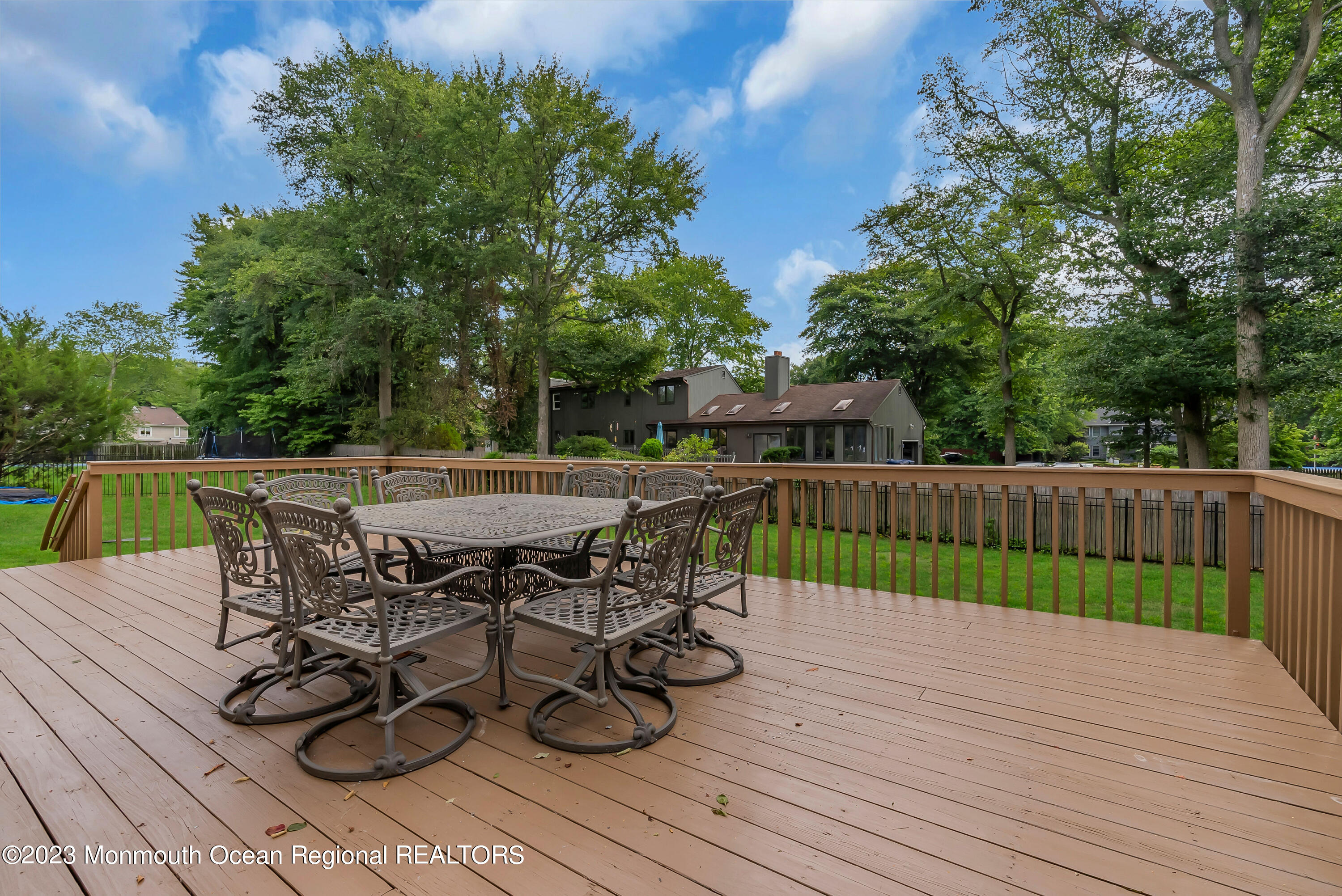 265 Whalepond Road Oakhurst, NJ 07755 - Photo 25 of 34 a view of a chairs and table on the wooden floor