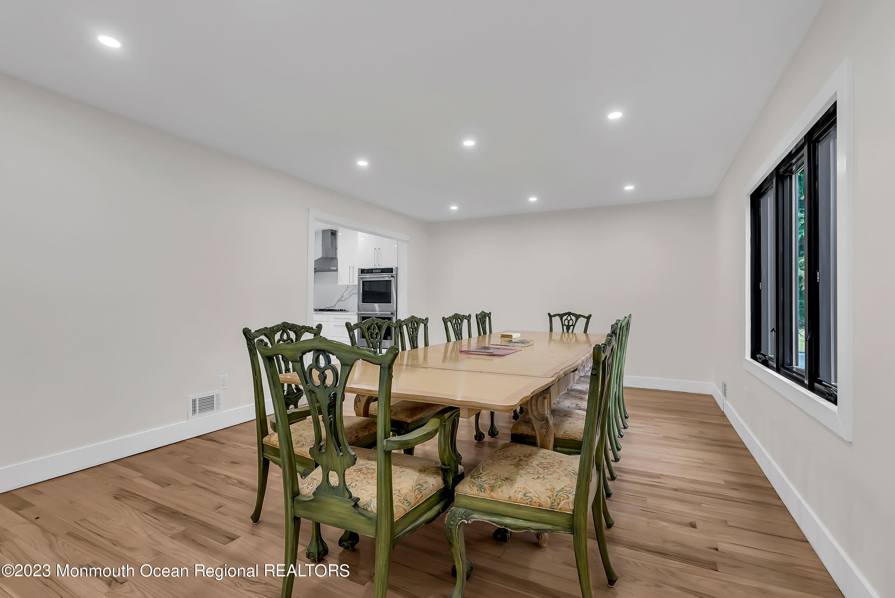 265 Whalepond Road Oakhurst, NJ 07755 - Photo 10 of 34 a view of a dining room with furniture and wooden floor