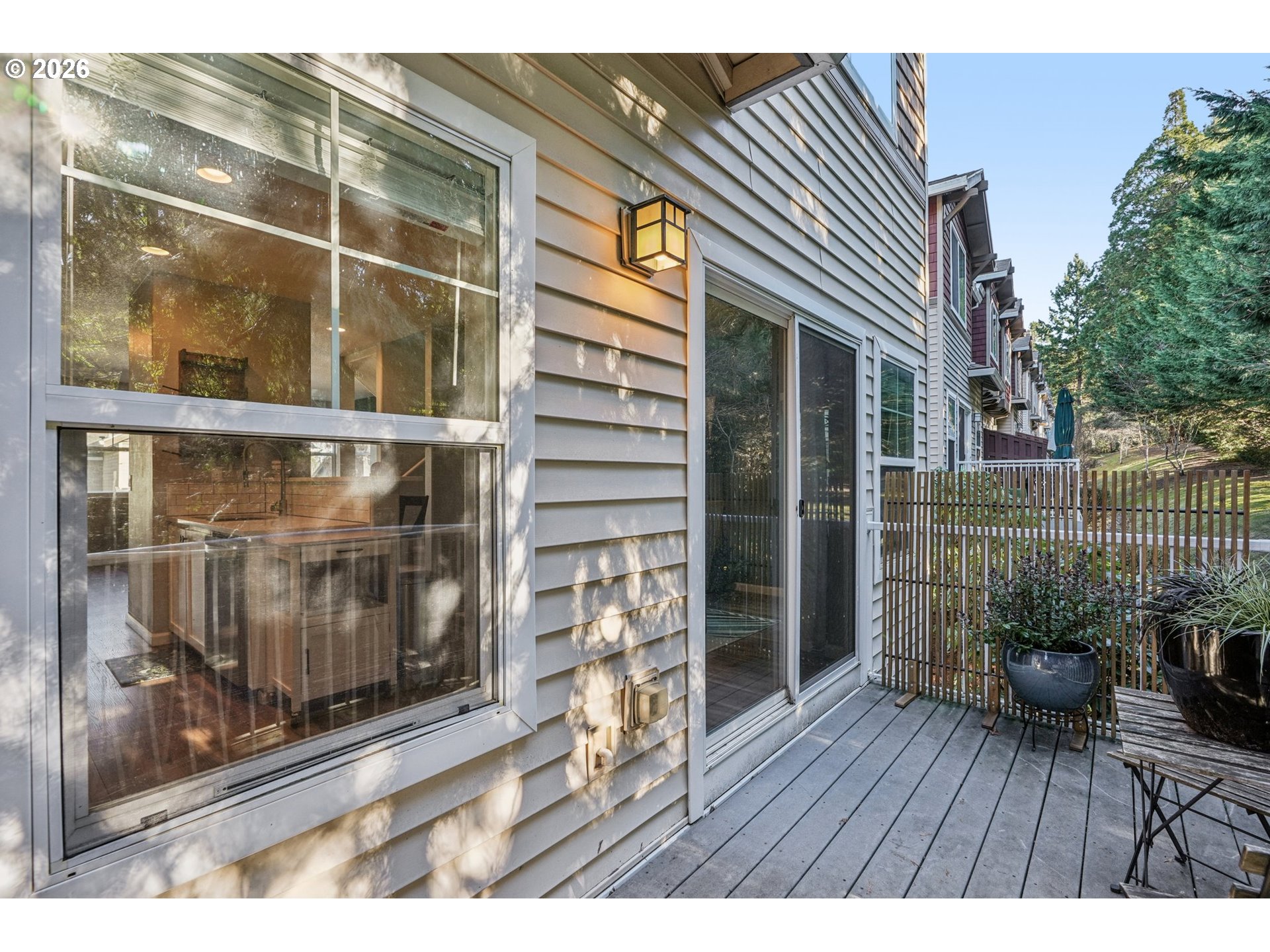 10739 Southwest Canterbury Lane, Unit 101 Portland, OR 97224 - Photo 25 of 27 a view of outdoor space building and window