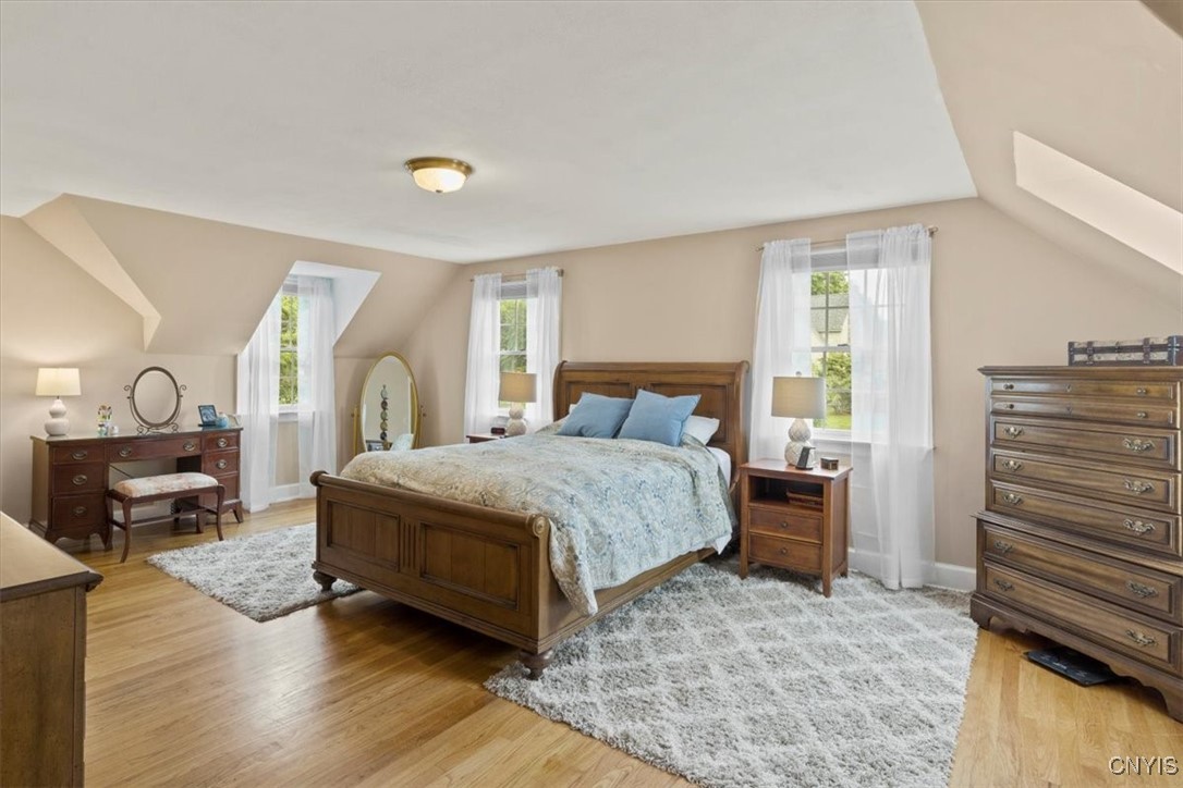 206 Lansdowne Road DeWitt, NY 13214 - Photo 6 of 50 large primary bedroom with walk-in closet and full