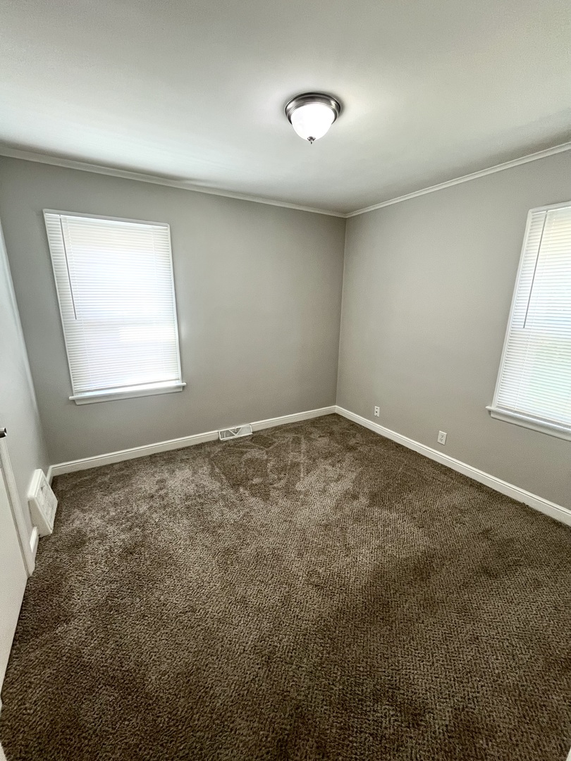 21142 Locust Street Matteson, IL 60443 - Photo 15 of 18 an empty room with a window