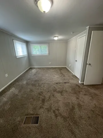 a view of a livingroom with a staircase