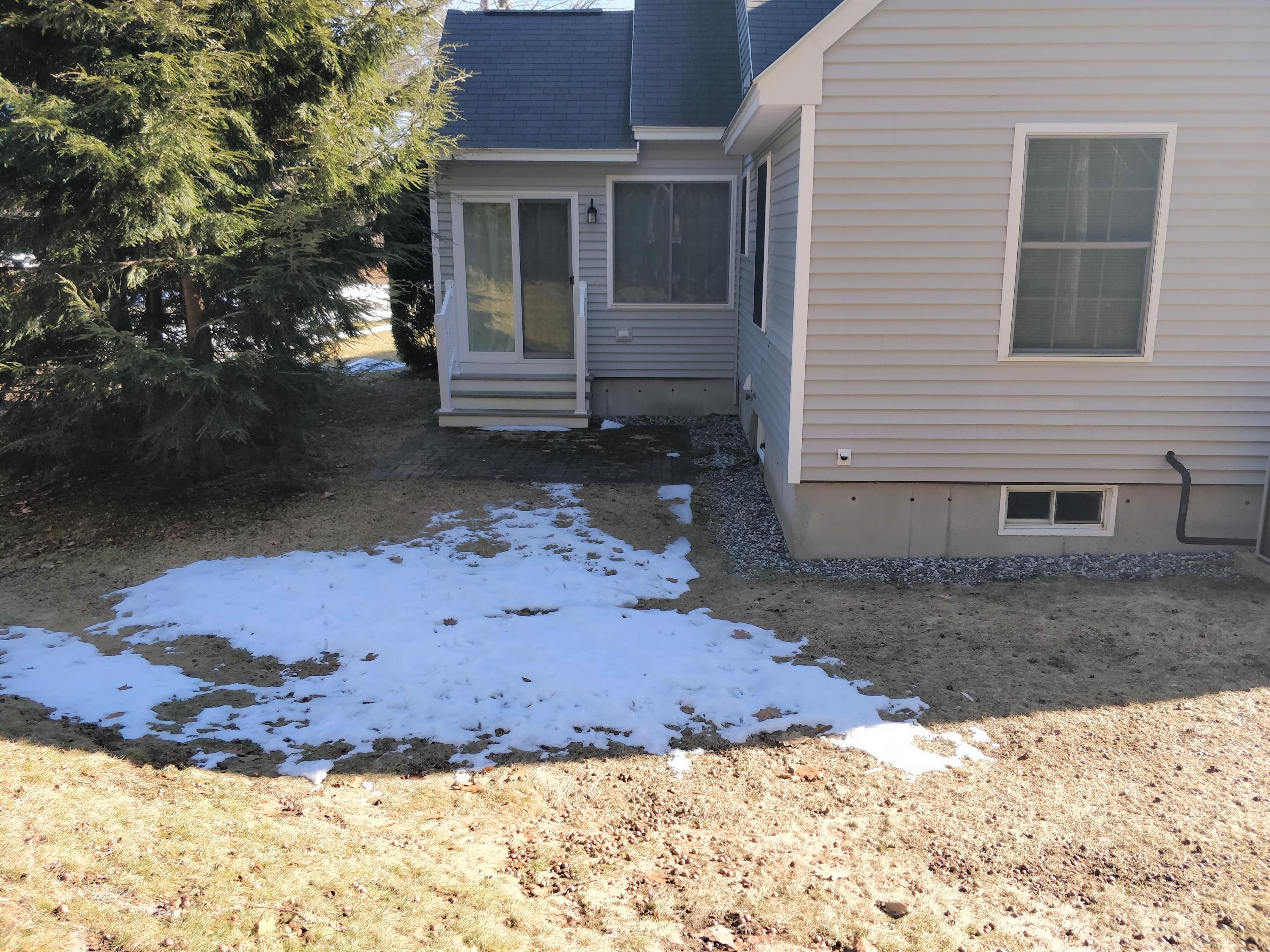 149 Spinnaker Ridge Drive, Unit 45 Wells, ME 04090 - Photo 25 of 27 Rear entrance to sunroom
