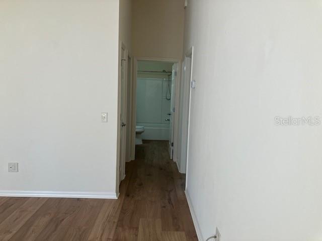 2016 Peaceful Place The Villages, FL 32162 - Photo 12 of 20 a view of a room with wooden floor