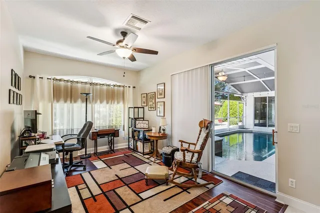 a view of a dining room with furniture window and outside view