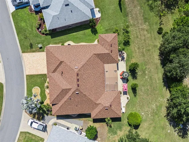 an aerial view of residential house with outdoor space