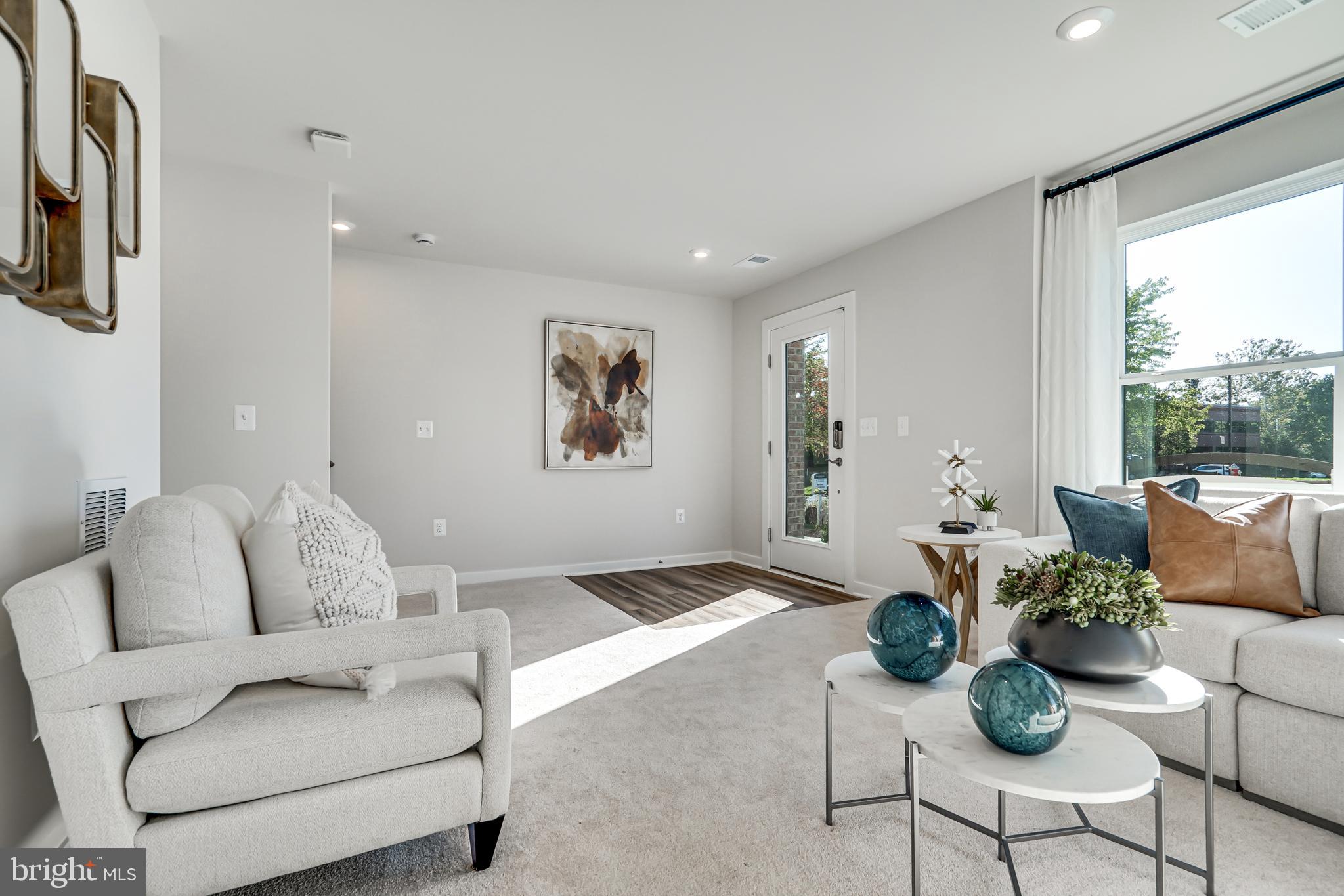 13656 Cobble Loop Woodbridge, VA 22193 - Photo 3 of 44 a living room with furniture and a large window