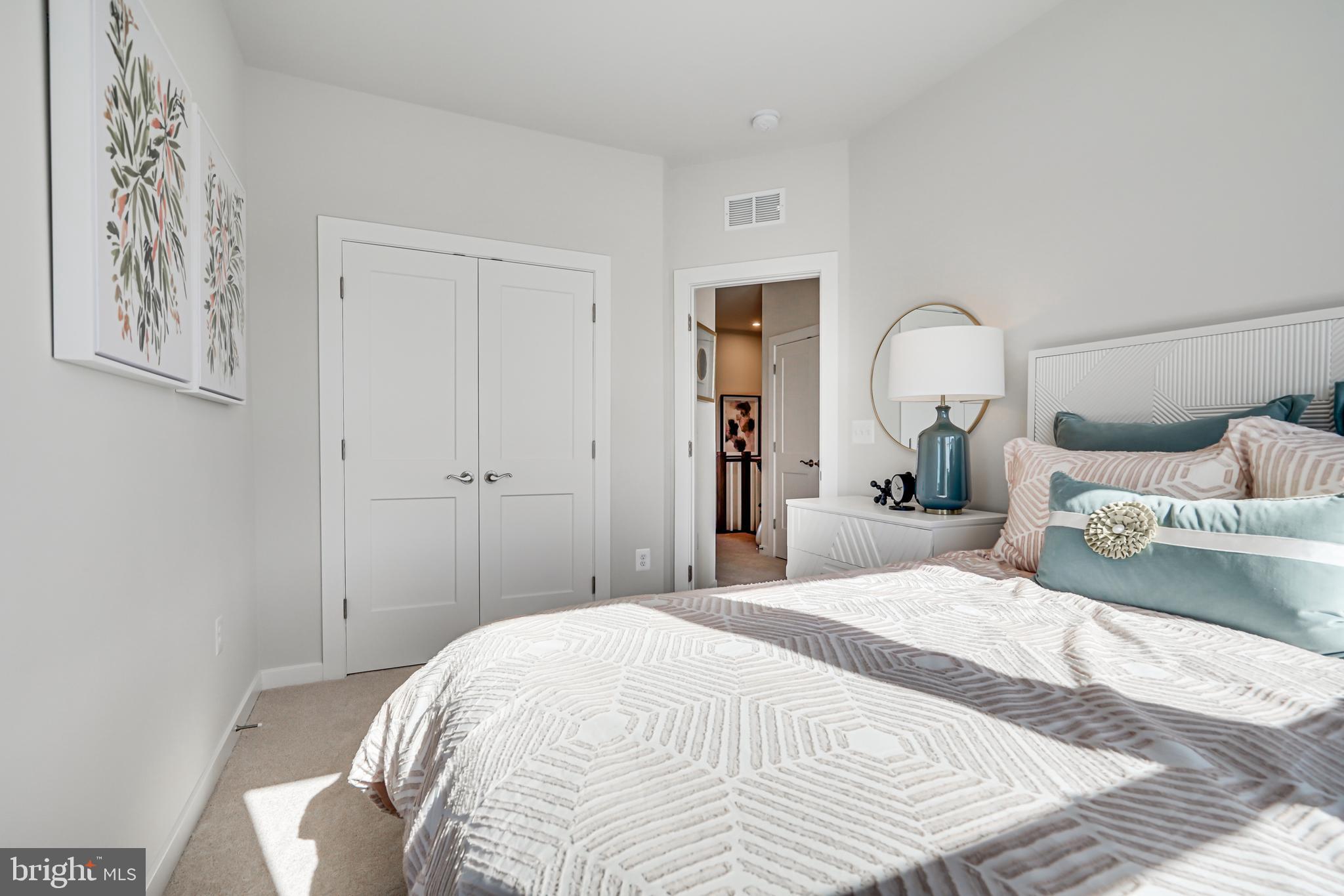 13656 Cobble Loop Woodbridge, VA 22193 - Photo 33 of 44 a bedroom with a bed and a view of bathroom