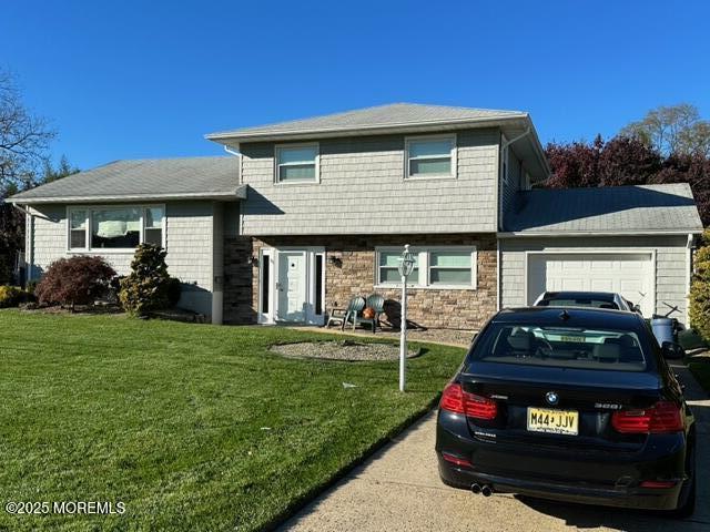 15 Cooper Avenue West Long Branch, NJ 07764 - Photo 1 of 13 a car parked in front of a house