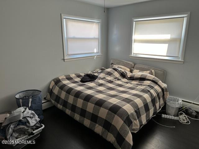 15 Cooper Avenue West Long Branch, NJ 07764 - Photo 7 of 13 a bedroom with a bed and window