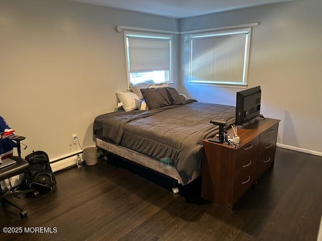 15 Cooper Avenue West Long Branch, NJ 07764 - Photo 9 of 13 a bedroom with a bed and a window