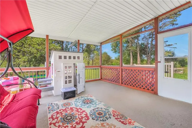 a view of a field with an ocean