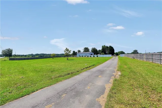 a view of a golf course with a garden