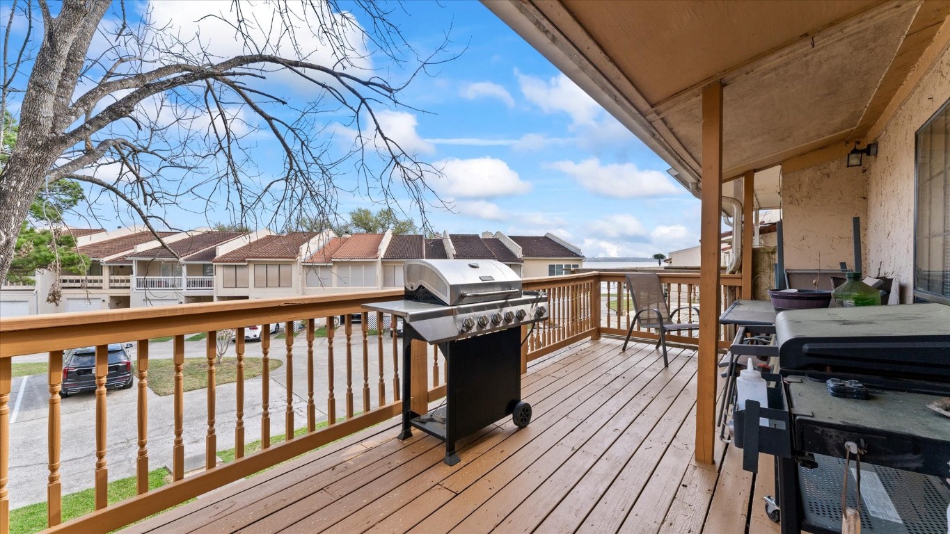 41 Regency Point Montgomery, TX 77356 - Photo 12 of 44 a view of a balcony with wooden floor and seating space