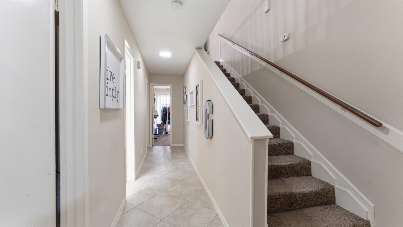 41 Regency Point Montgomery, TX 77356 - Photo 19 of 44 a view of entryway and hall with wooden floor