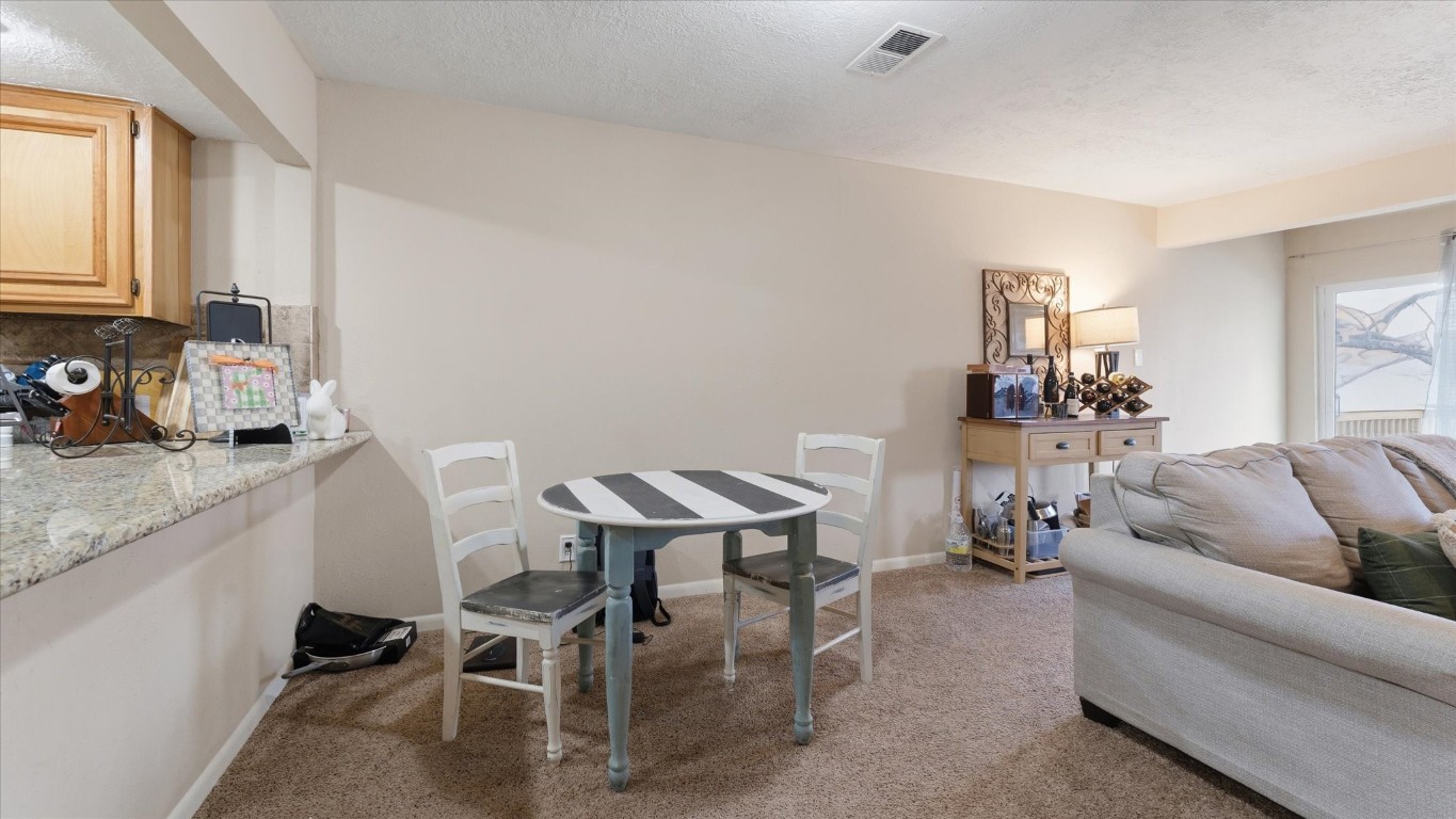 41 Regency Point Montgomery, TX 77356 - Photo 20 of 44 a living room with furniture and a dining table