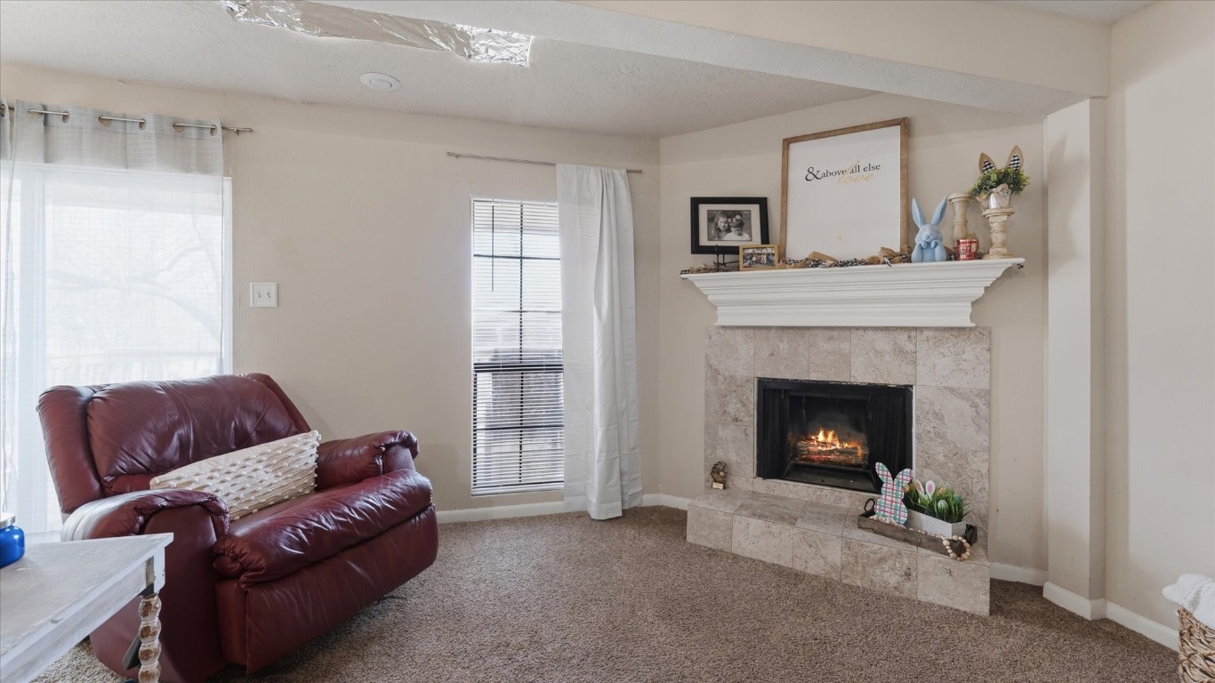 41 Regency Point Montgomery, TX 77356 - Photo 23 of 44 a living room with furniture and a fireplace