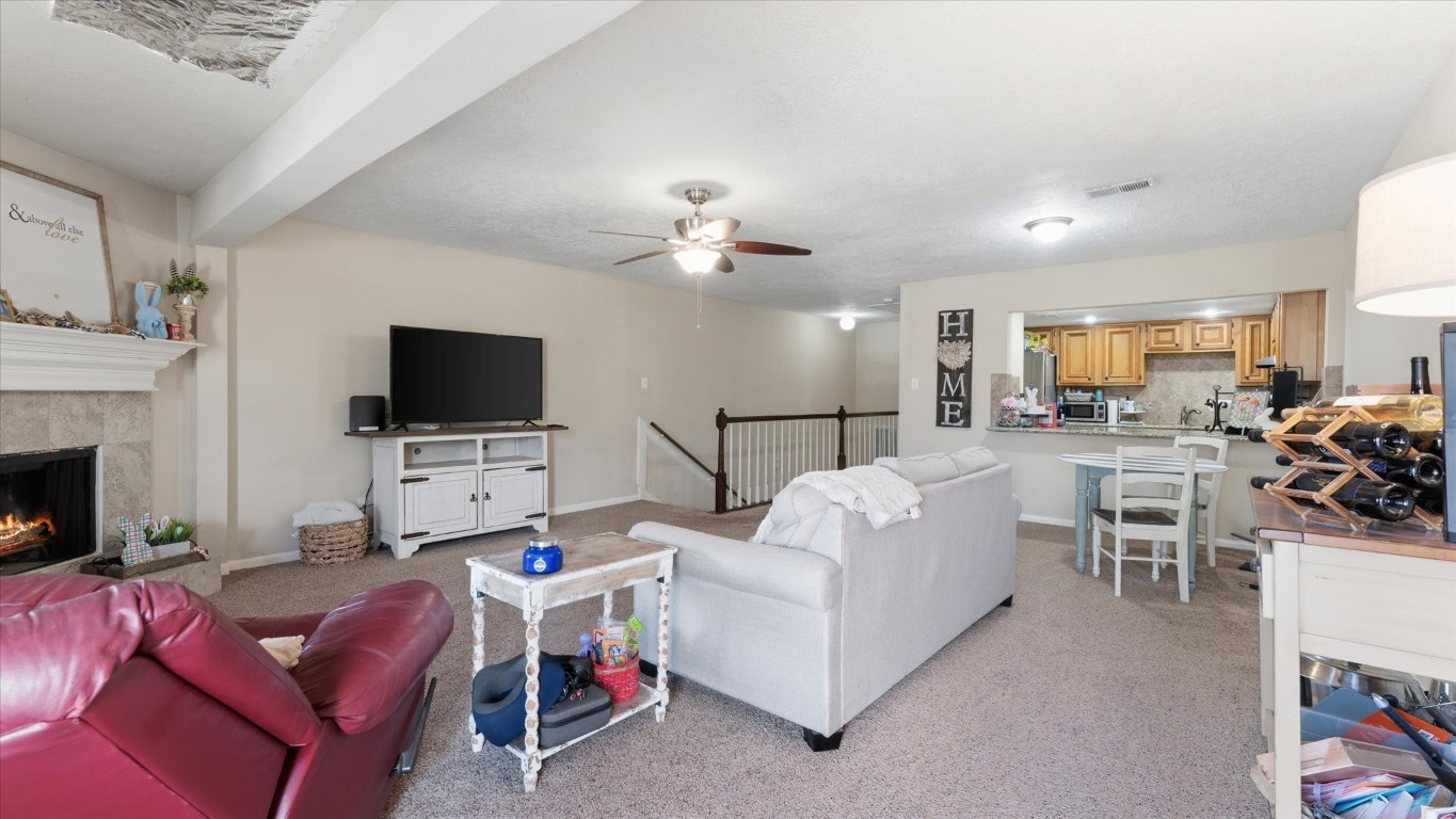41 Regency Point Montgomery, TX 77356 - Photo 24 of 44 a living room with furniture and a flat screen tv