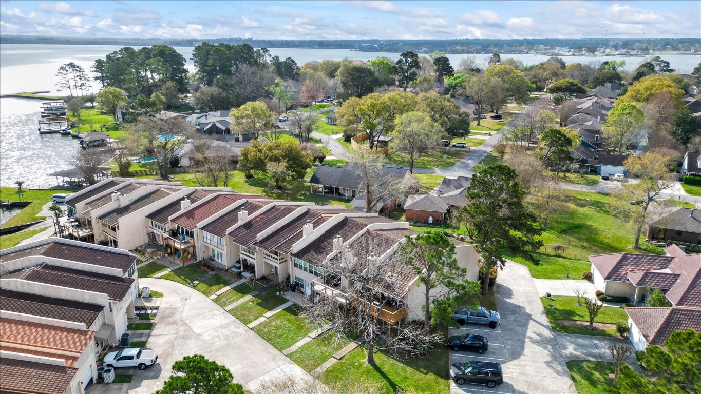 41 Regency Point Montgomery, TX 77356 - Photo 3 of 44 a view of a yard with an outdoor space