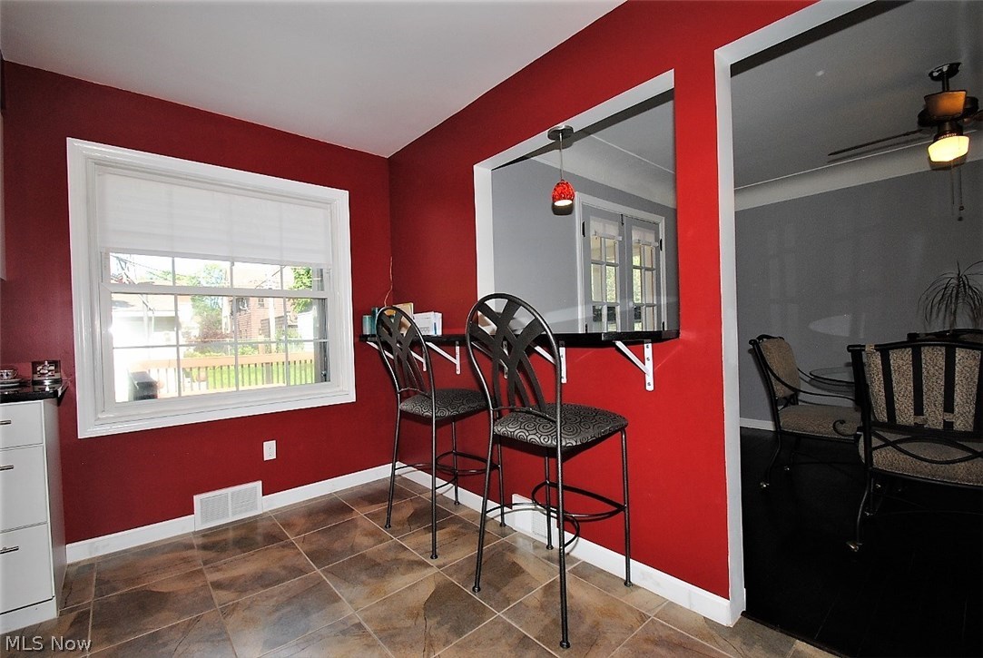 3634 Lynnfield Road Shaker Heights, OH 44122 - Photo 9 of 24 DINING BAR OPENS TO DINING ROOM