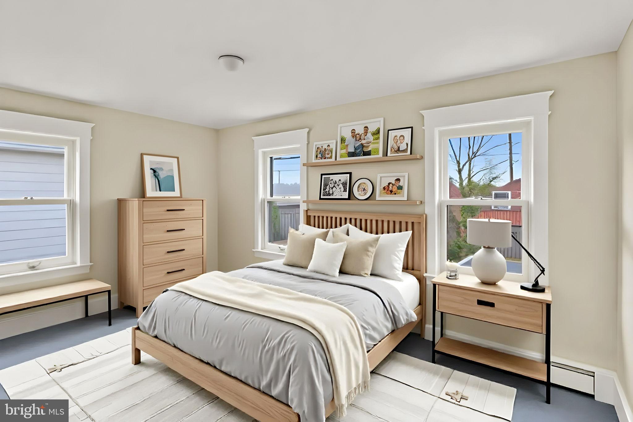 118 Hunter Avenue Hamilton, NJ 08610 - Photo 14 of 23 a bed room with a bed and a window