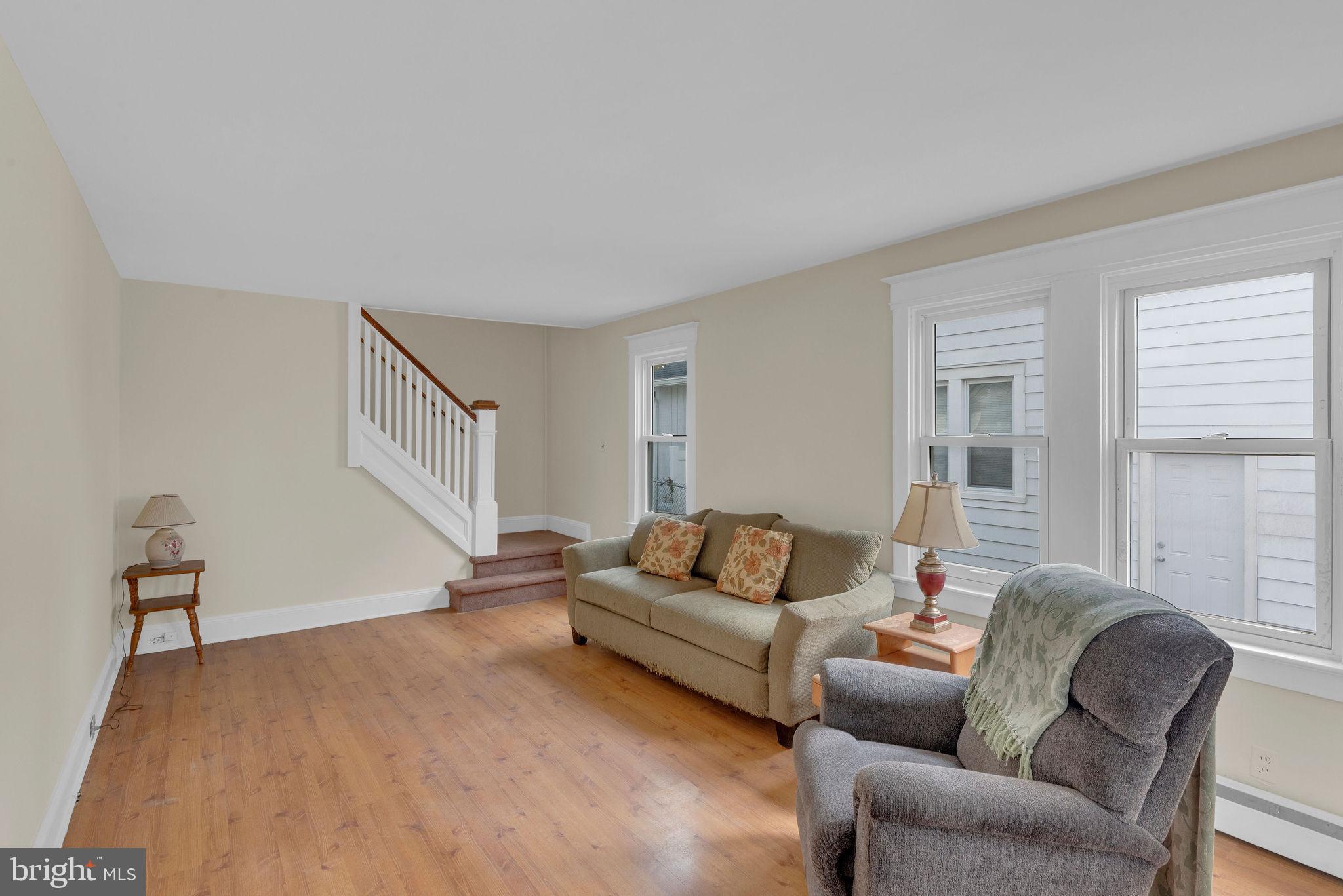118 Hunter Avenue Hamilton, NJ 08610 - Photo 5 of 23 a living room with furniture and a window