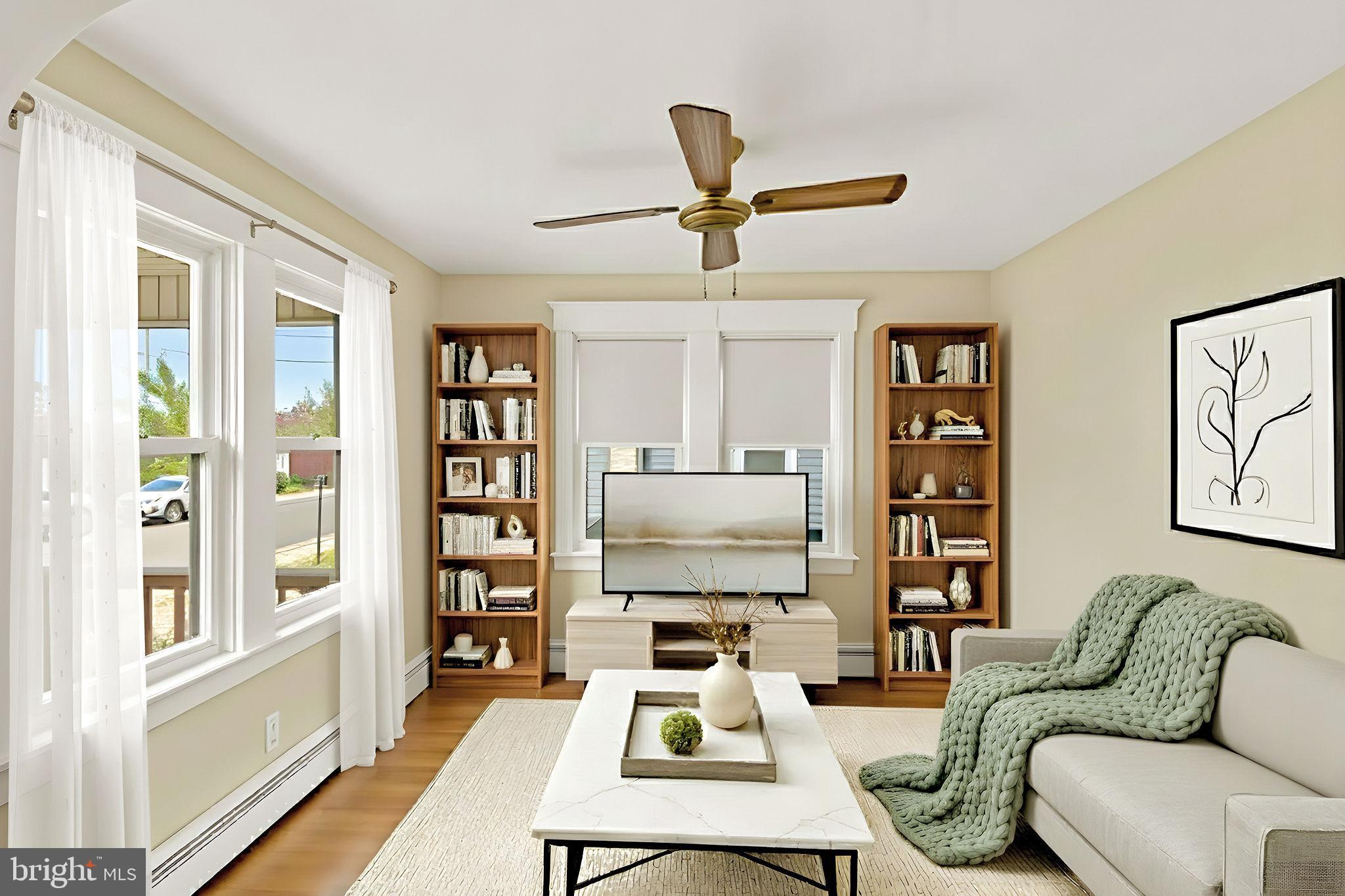 118 Hunter Avenue Hamilton, NJ 08610 - Photo 9 of 23 a living room with furniture and a flat screen tv