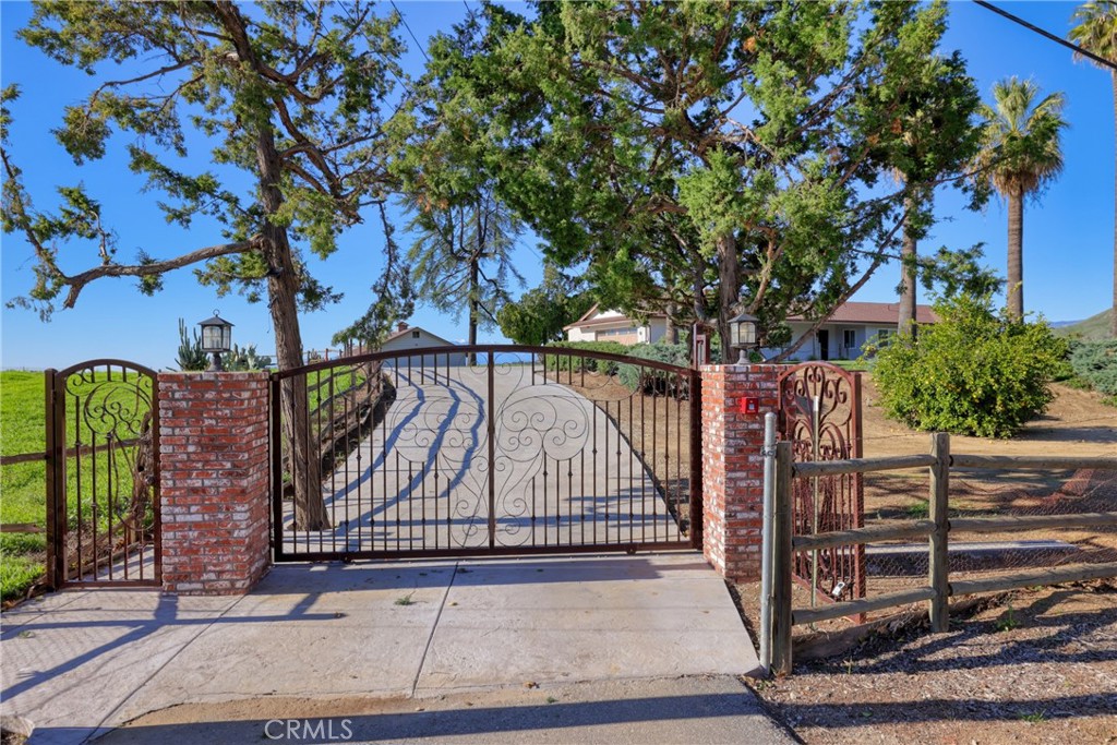 12646 10th Street Yucaipa, CA 92399 - Photo 1 of 72 a view of street along with wooden stairs