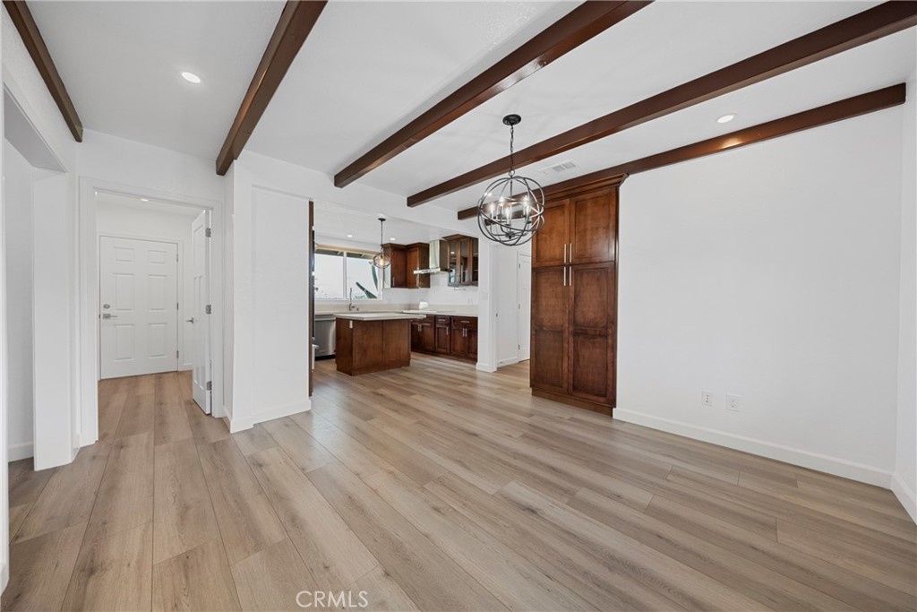 12646 10th Street Yucaipa, CA 92399 - Photo 13 of 72 a view of a livingroom with wooden floor