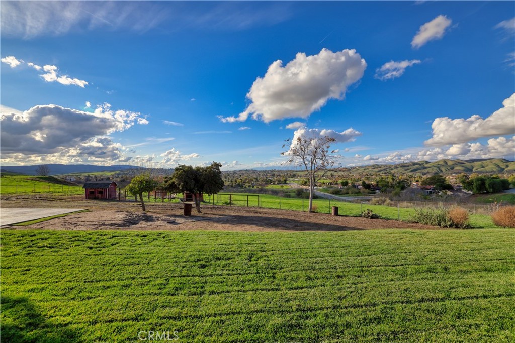 12646 10th Street Yucaipa, CA 92399 - Photo 42 of 72 a view of a golf course with a lake