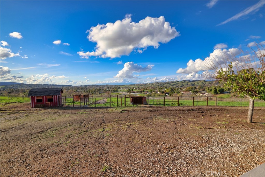 12646 10th Street Yucaipa, CA 92399 - Photo 44 of 72 a view of a big yard with table and chairs