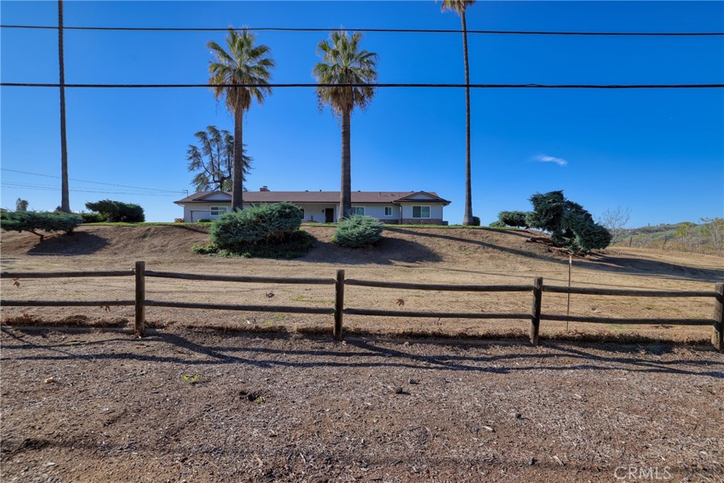 12646 10th Street Yucaipa, CA 92399 - Photo 71 of 72 a view of a yard with wooden fence
