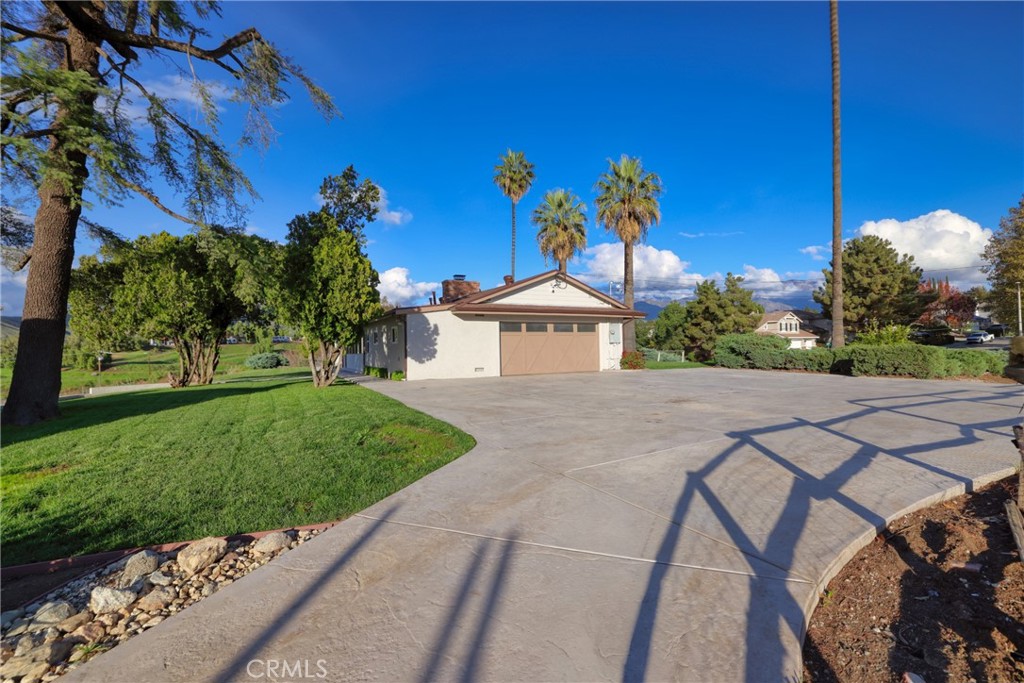 12646 10th Street Yucaipa, CA 92399 - Photo 72 of 72 a front view of a house with a yard