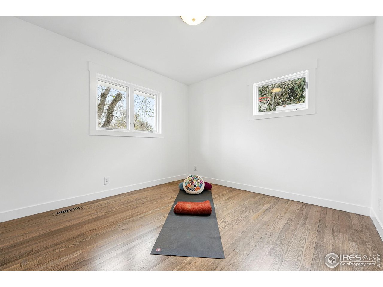 2970 21st Street Boulder, CO 80304 - Photo 16 of 33 a view of an empty room with wooden floor