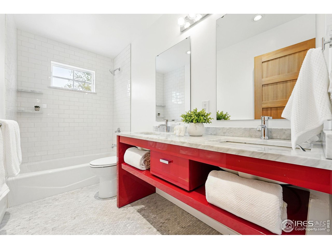 2970 21st Street Boulder, CO 80304 - Photo 26 of 33 a bathroom with a bath tub sink and mirror