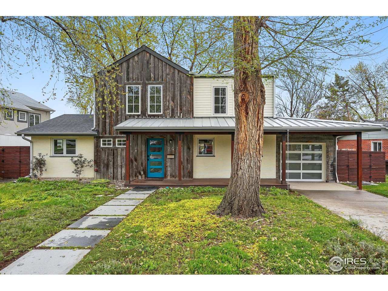 2970 21st Street Boulder, CO 80304 - Photo 31 of 33 a front view of a house with a yard