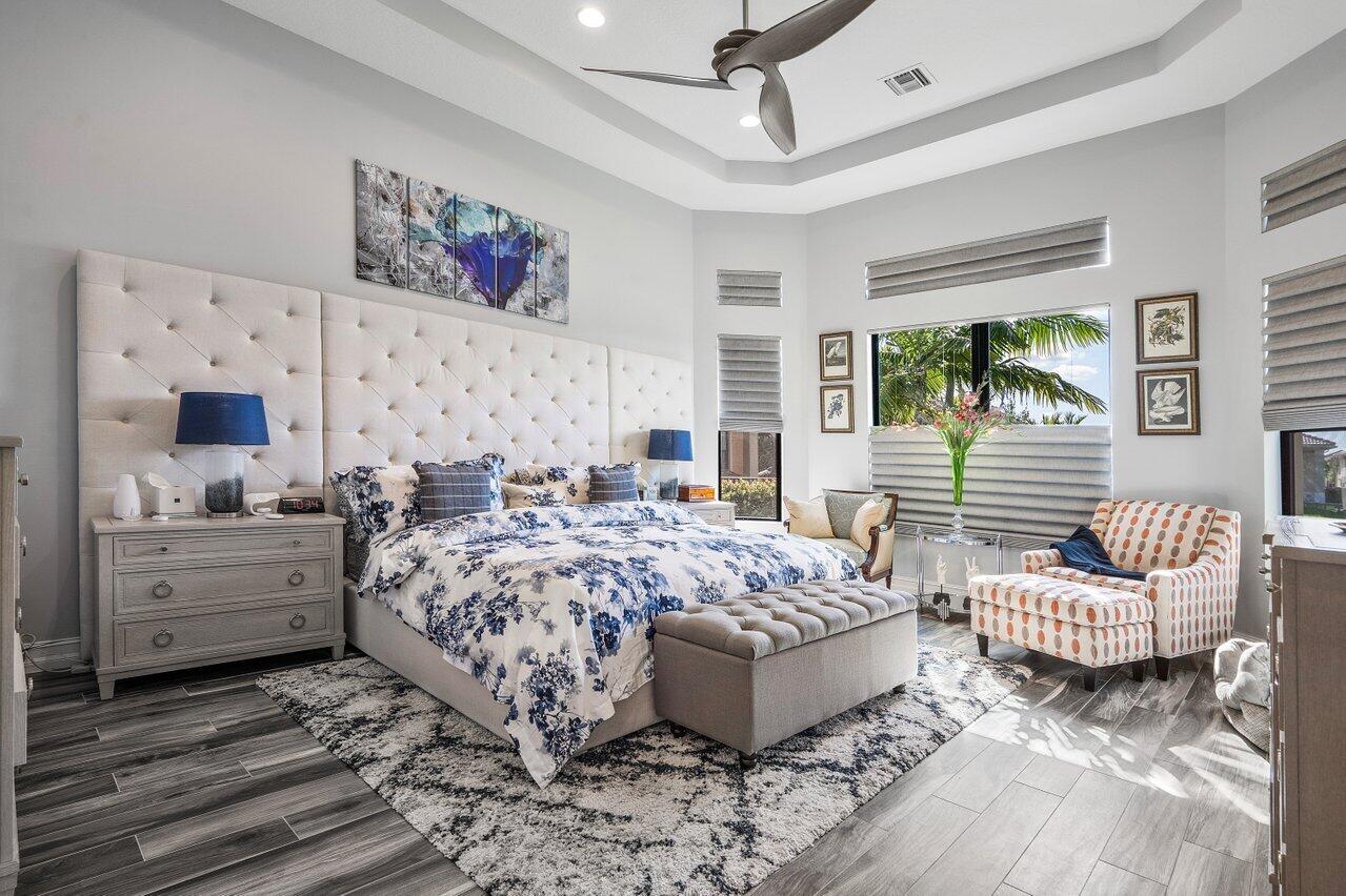 11792 Leon Circle Parkland, FL 33076 - Photo 13 of 51 a bed room with furniture and a window