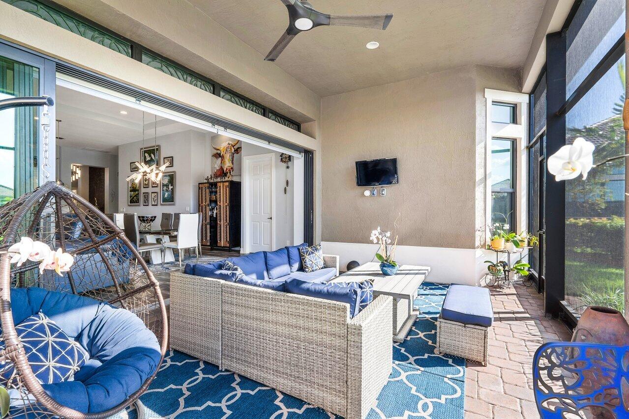 11792 Leon Circle Parkland, FL 33076 - Photo 23 of 51 a living room with furniture and wooden floor