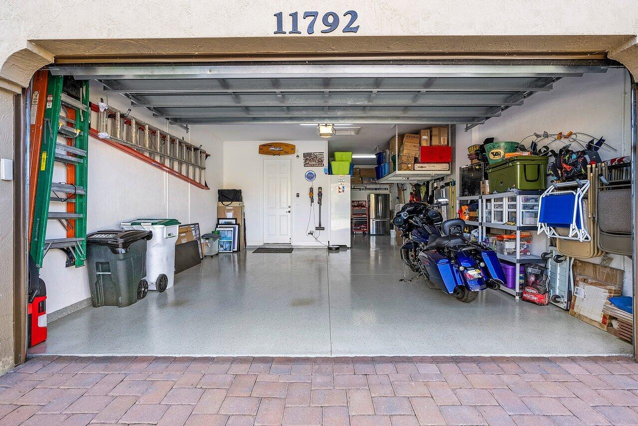11792 Leon Circle Parkland, FL 33076 - Photo 30 of 51 a view of a storage room with racks
