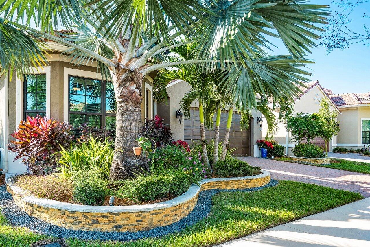 11792 Leon Circle Parkland, FL 33076 - Photo 40 of 51 a view of a house with a swimming pool